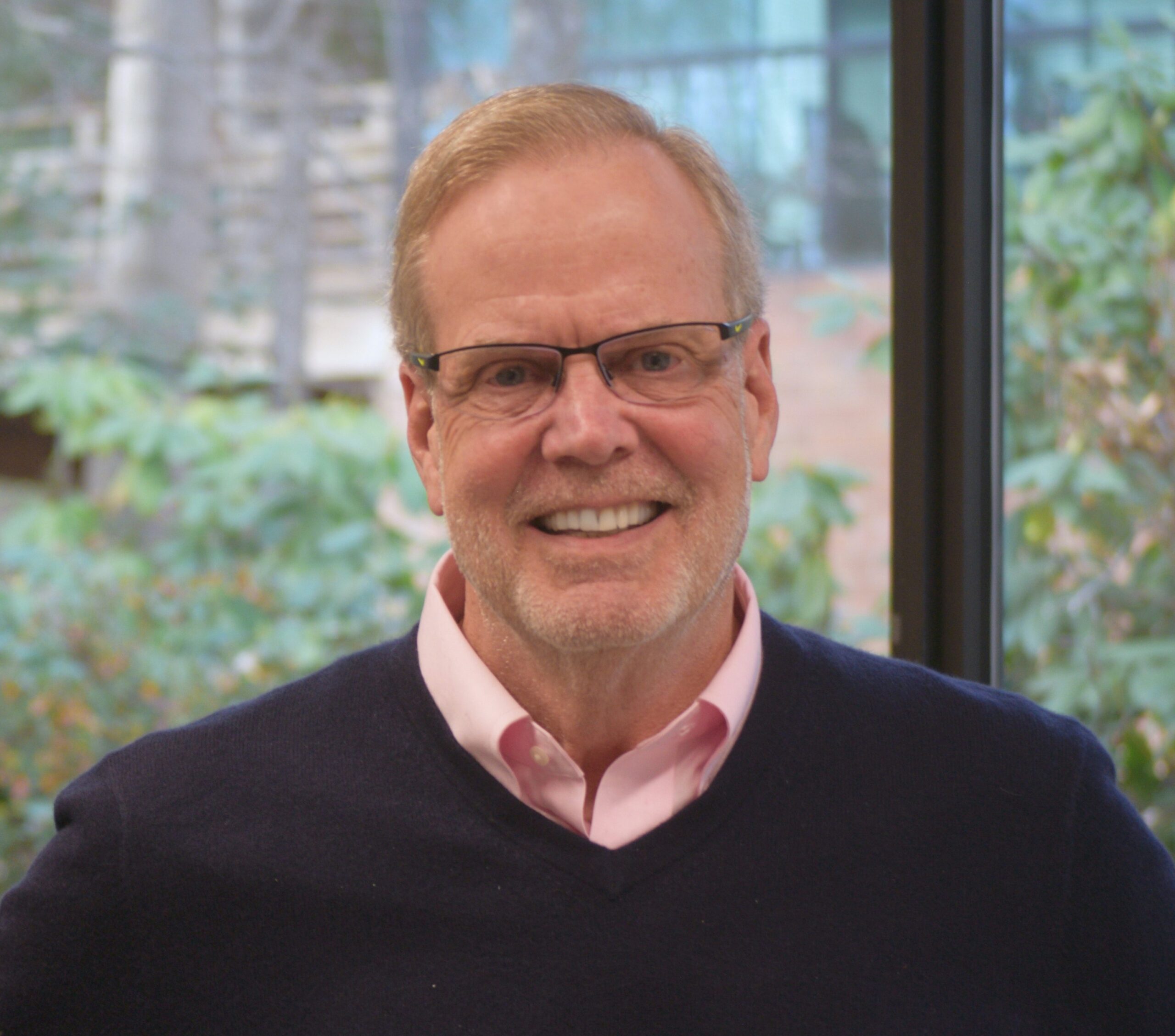 Ken-standing-smiles About Ken Garner
